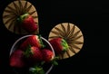 Strawberry white bowl photo with dark background Royalty Free Stock Photo