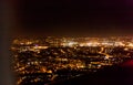 Dark background view of city with lights from aeroplane. Night lights in the city. Aeroplane view of dark nigh above the Royalty Free Stock Photo