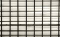 dark bars on a background of gray galvanized sheet, the intersection the horizontal and vertical. Royalty Free Stock Photo