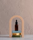 bath bottle and soap on arch decorated background Royalty Free Stock Photo