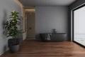 Dark bathroom interior with black parquet floor, black bathtub, black toilet and square mirrors, shower, Royalty Free Stock Photo