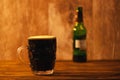 Dark beer in british dimpled glass pint mug