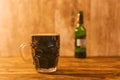 Dark beer in british dimpled glass pint mug