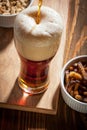 Dark beer with snacks Royalty Free Stock Photo