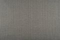 Dark beige fabric texture - close-up of a sofa upholstery Royalty Free Stock Photo