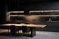 dark black kitchen with wood table and modern lighting fixtures on the wall Royalty Free Stock Photo