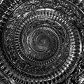 Dark black metal abstract spiral background pattern fractal. Black metallic decorative ornament element. Black metallic spiral bac