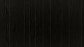Dark black wood grain texture with vertical plank lines and subtle grain patterns Royalty Free Stock Photo