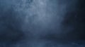 Dark blue abstract background in cyclorama style in misty atmosphere.