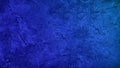 Dark blue abstract background. Gradient. Old painted rough wall surface texture. Close-up. Royalty Free Stock Photo