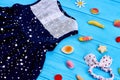 Dark blue baby sundress, accessories.