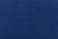 Dark blue background from textile material. Fabric with natural texture. Royalty Free Stock Photo