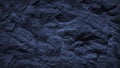 Dark blue background. Toned rock texture. Detail. Volumetric stone background. Royalty Free Stock Photo