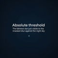 Dark blue background with white text reading Absolute threshold Royalty Free Stock Photo