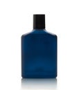 Dark blue Bottle of Perfume isolated on white background with reflection and clipping path. Royalty Free Stock Photo