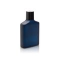 Dark blue Bottle of Perfume isolated on white background with reflection and clipping path. Royalty Free Stock Photo