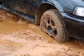 Car stuck in mud after floods caused by storm Royalty Free Stock Photo