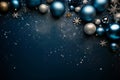 Dark blue Christmas decoration balls on a sea of glitter sand background. Merry christmas and happy new year greeting card with Royalty Free Stock Photo