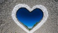 dark blue color broken heart with gray color broken wall background. Ai Generative Royalty Free Stock Photo