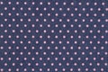 Dark blue denim with pink polka dot fabric background