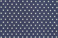 Dark blue denim with yellow polka dot fabric background