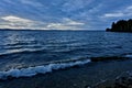 Dark blue evening cloudy sky over the lake Royalty Free Stock Photo