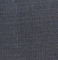 Dark blue fabric background with spots. The texture of the fabric in the perpendicular lines