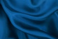 Dark blue fabric cloth texture for background and design art work, beautiful crumpled pattern of silk or linen Royalty Free Stock Photo