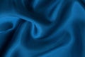 Dark blue fabric cloth texture for background and design art work, beautiful crumpled pattern of silk or linen Royalty Free Stock Photo