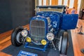 Dark blue Ford hot rod car Royalty Free Stock Photo