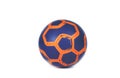 Dark blue futsal soccer ball with orange stripes isolated on white background