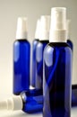 Dark blue glass bottles for cosmetic lotions, serums, oils