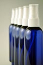 Dark blue glass bottles for cosmetic lotions, serums, oils Royalty Free Stock Photo