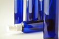 Dark blue glass bottles for cosmetic lotions, serums, oils