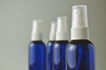 Dark blue glass bottles for cosmetic lotions, serums, oils Royalty Free Stock Photo