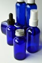 Dark blue glass bottles for cosmetic lotions, serums, oils