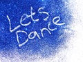 Dark blue glitter sparkle with words Let's Dance on white background Royalty Free Stock Photo