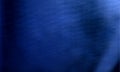 dark blue grunge fabric wrinkles background