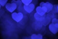 Dark blue heart bokeh background photo, abstract holiday backdrop Royalty Free Stock Photo