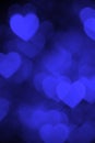 Dark blue heart bokeh background photo, abstract holiday backdrop Royalty Free Stock Photo