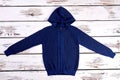 Dark blue hooded knitted pullover. Royalty Free Stock Photo
