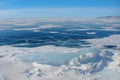 dark blue ice on winter lake, arctic landscape