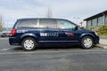 Dark Blue King County Metro Vanshare vehicle parked