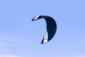 Dark blue kiteboarding kite against blue sky Royalty Free Stock Photo