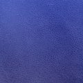 Dark blue leather texture closeup. Blue wall texture for design