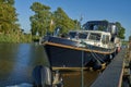 Dark blue leisure boat at Abser Sieltief Germany