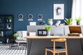 Dark blue interior with workspace Royalty Free Stock Photo