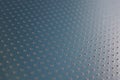 Dark blue metal background or wallpaper. Abstract aluminum surface with many notch spots. Their ranks go into the distance and