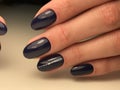 Dark blue nails with gel polish Royalty Free Stock Photo