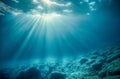 Dark blue ocean surface seen from underwater. Abstract waves underwater and rays of sunlight shining through. Generative AI Royalty Free Stock Photo